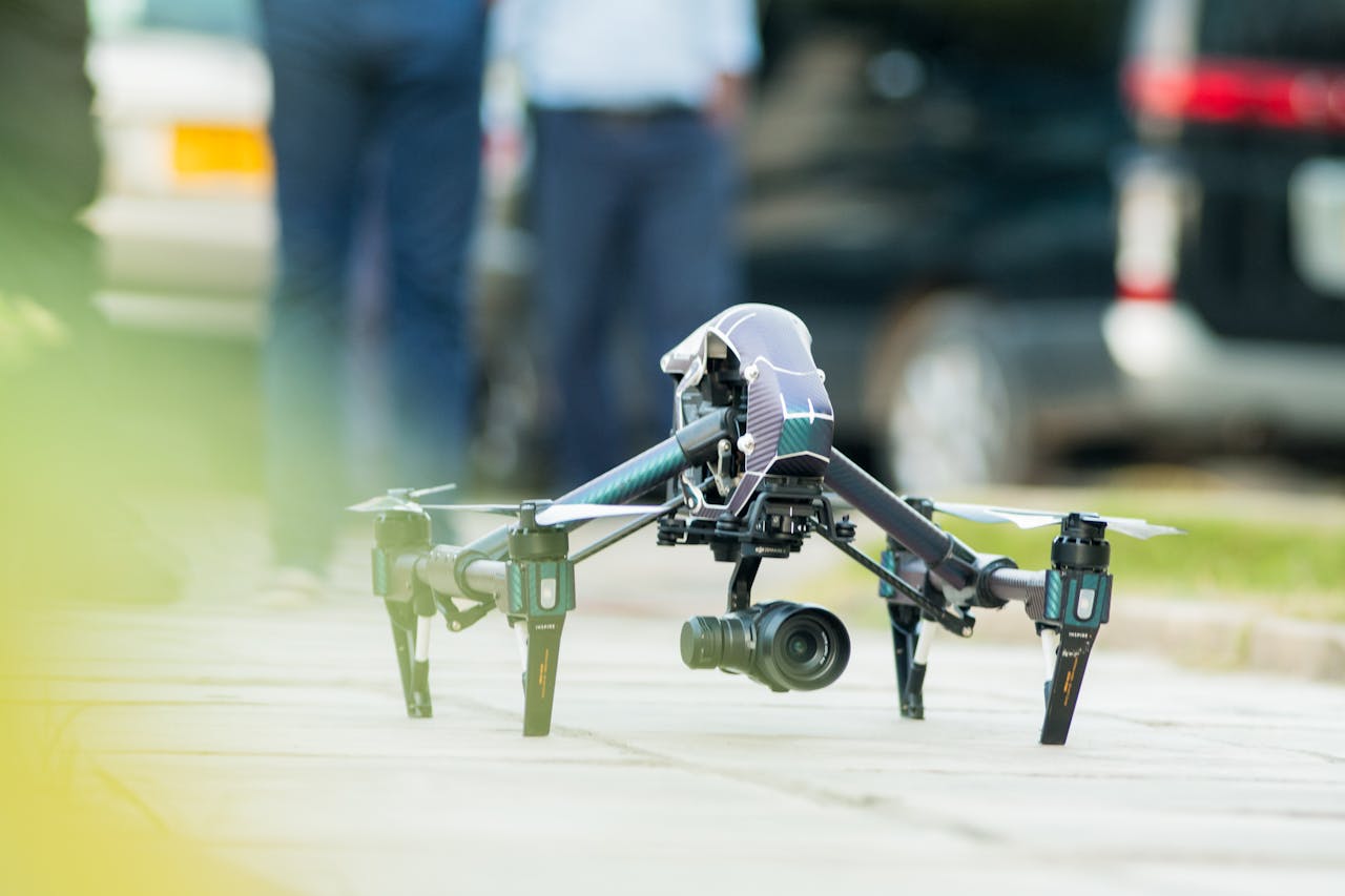 A high-tech drone on the street in Dar es Salaam, Tanzania, capturing urban scenes.